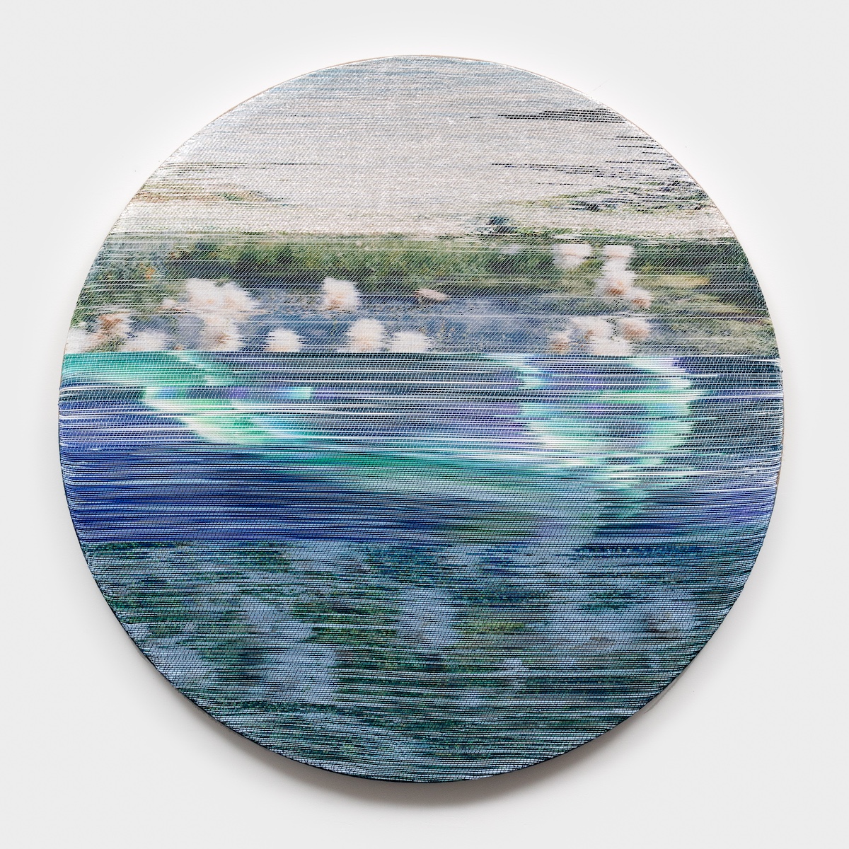 <p>Margo Wolowiec<br /><em>Aurora</em>, 2025<br />Handwoven polymer, linen, sterling silver-leafed thread, indigo, dye sublimation ink, mounted on indigo dyed hemp support<br />40 x 40 x 2 inches / 101.6 x 101.6 x 5.1 cm</p>
