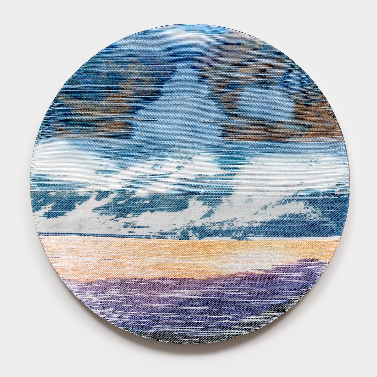 <p>Margo Wolowiec<br /><em>Last Sunset</em>, 2025<br />Handwoven polymer, linen, sterling silver-leafed thread, indigo, dye sublimation ink, mounted on indigo dyed hemp support<br />40 x 40 x 2 inches / 101.6 x 101.6 x 5.1 cm</p>
