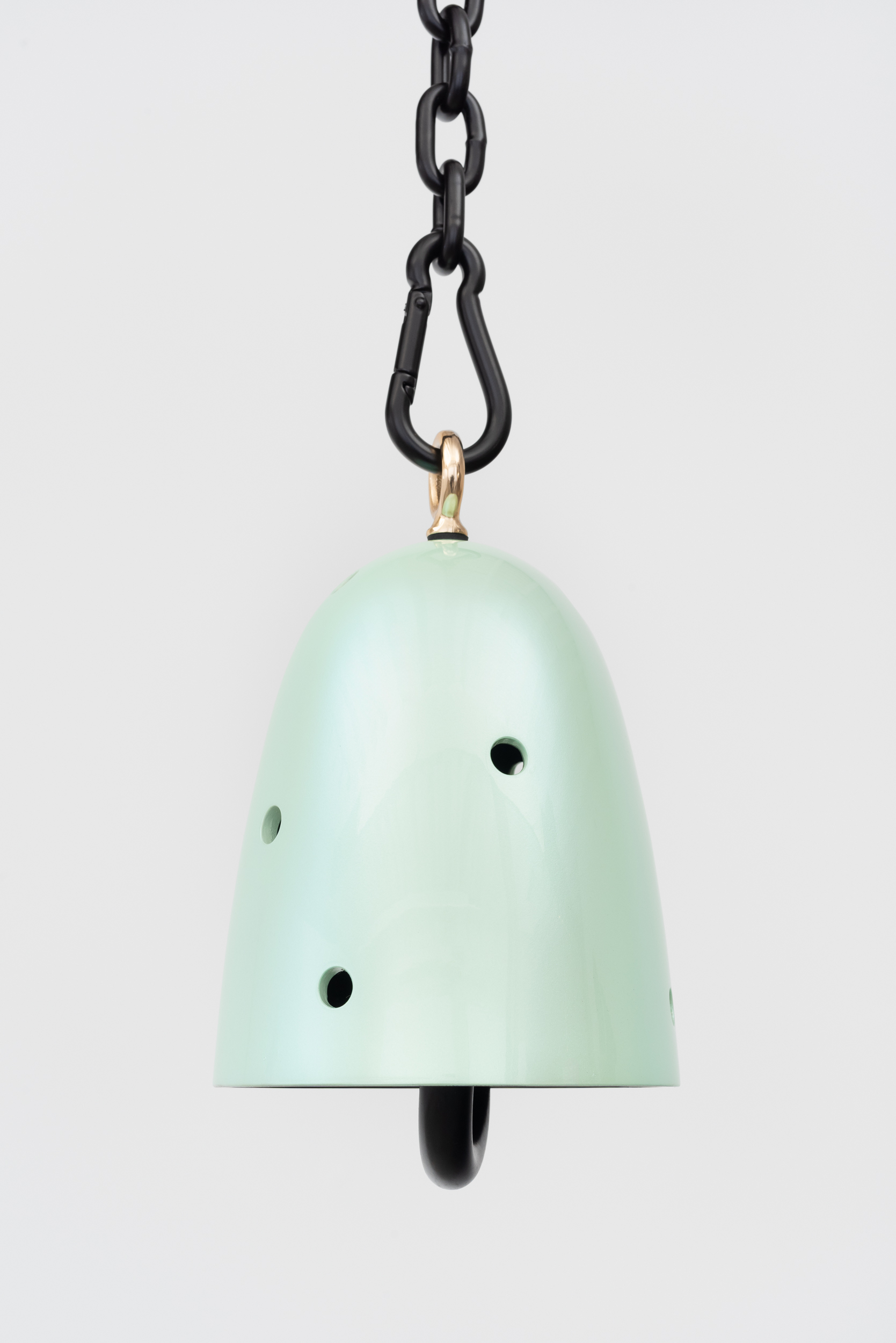 Davina Semo<br><em>Aglow</em>, 2025<br>Cast bronze bell, UV protected 3-stage catalyzed urethane automotive finish, patinated solid bronze clapper, hemp shibari rope, polished and plated stainless steel hardware, powder coated stainless steel hardware, powder coated zinc plated steel chain<br>Bell: 10 x 6 1/2 x 6 1/2 inches / 25.4 x 16.5 x 16.5 cm<br>Overall dimensions variable<br>