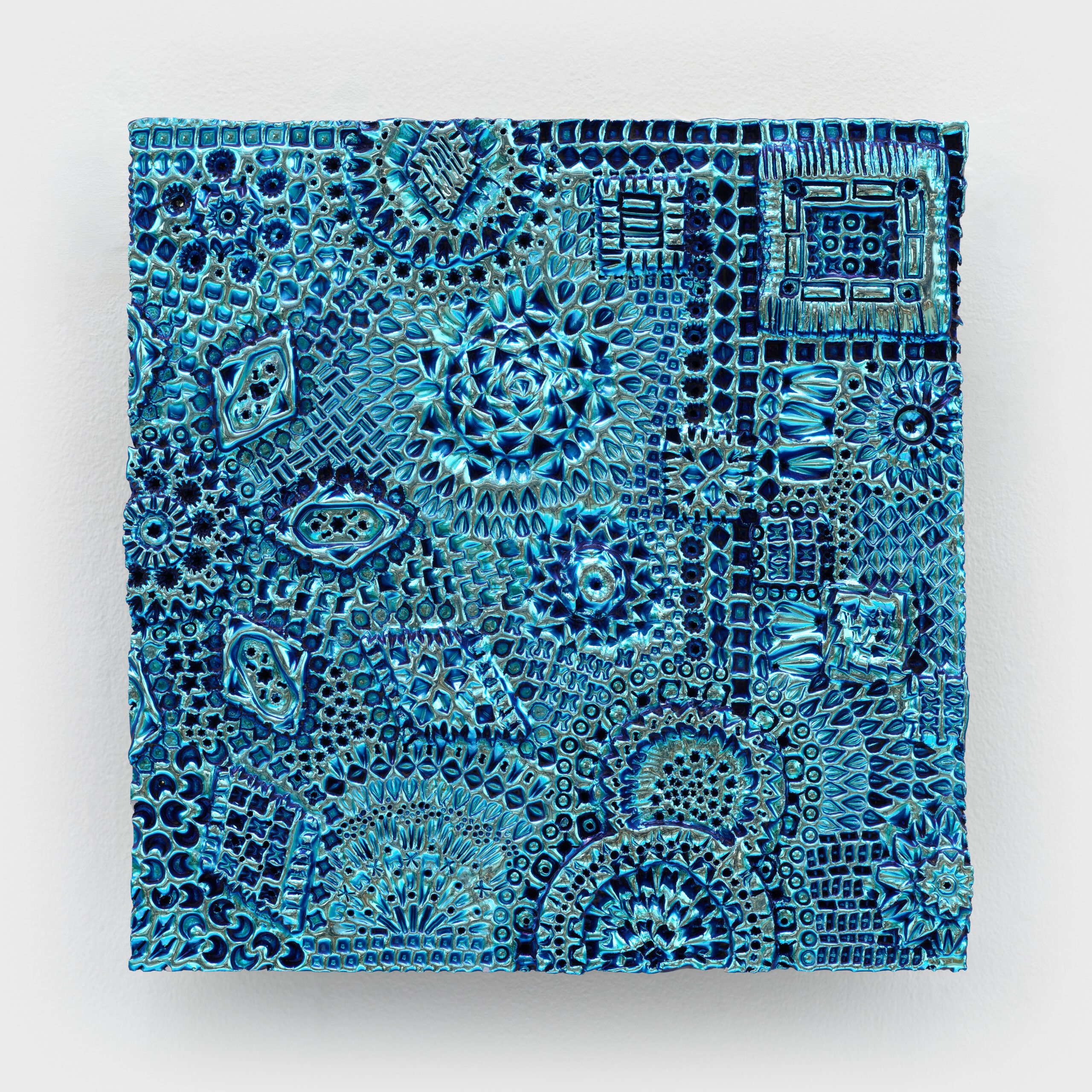 Pae White<br><em>blue mourning</em>, 2022<br>Glazed ceramic with PVD<br>12.5 x 12.5 x 2 inches / 31.8 x 31.8 x 5.1 cm