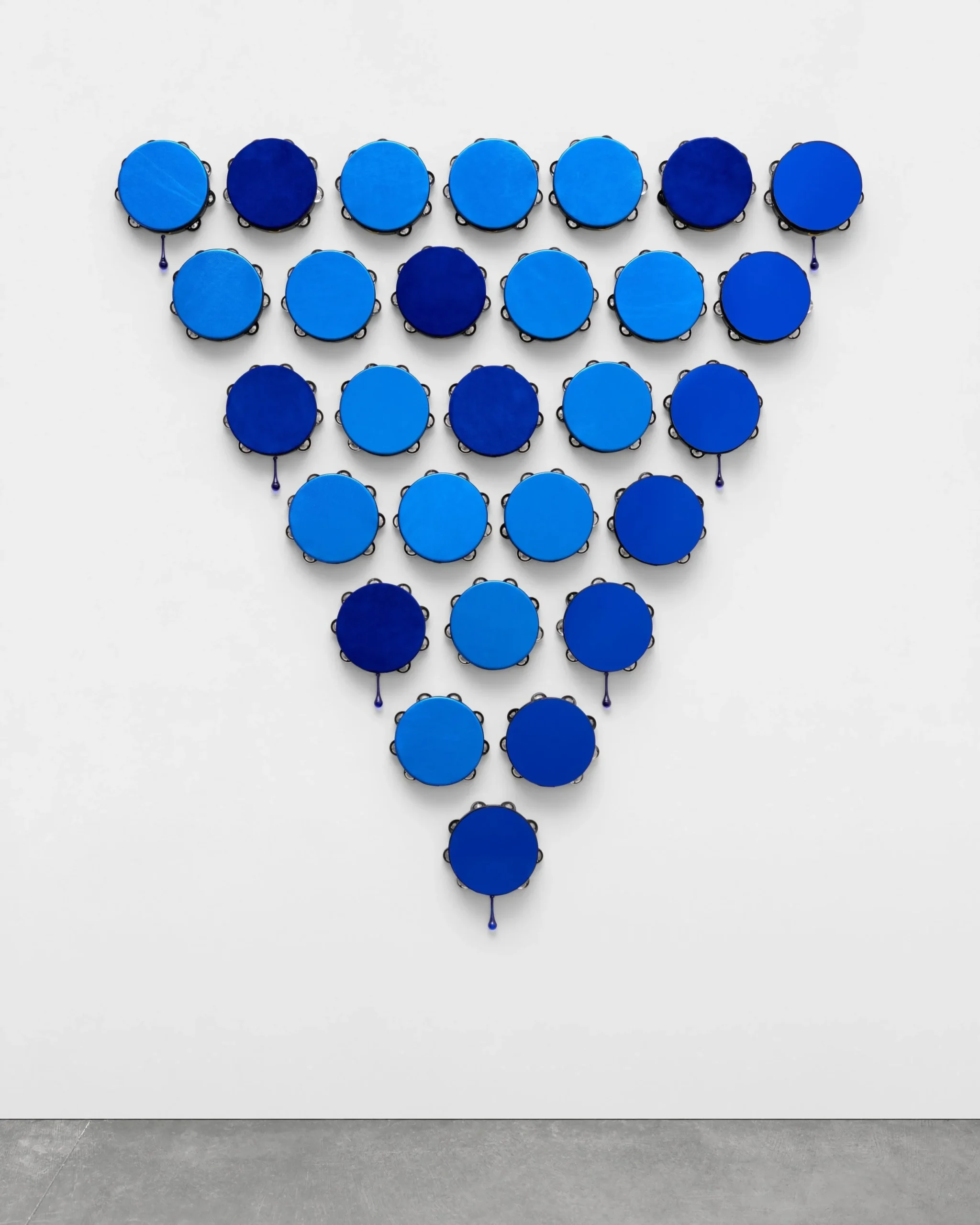 <p>Lava Thomas<br /><em>A Change is Gonna Come</em>, 2018<br />Pyrographic calligraphy on leather; suede, acrylic disks, lampblown glass, tambourines<br />70 x 50 inches / 177.8 x 127 cm</p>
