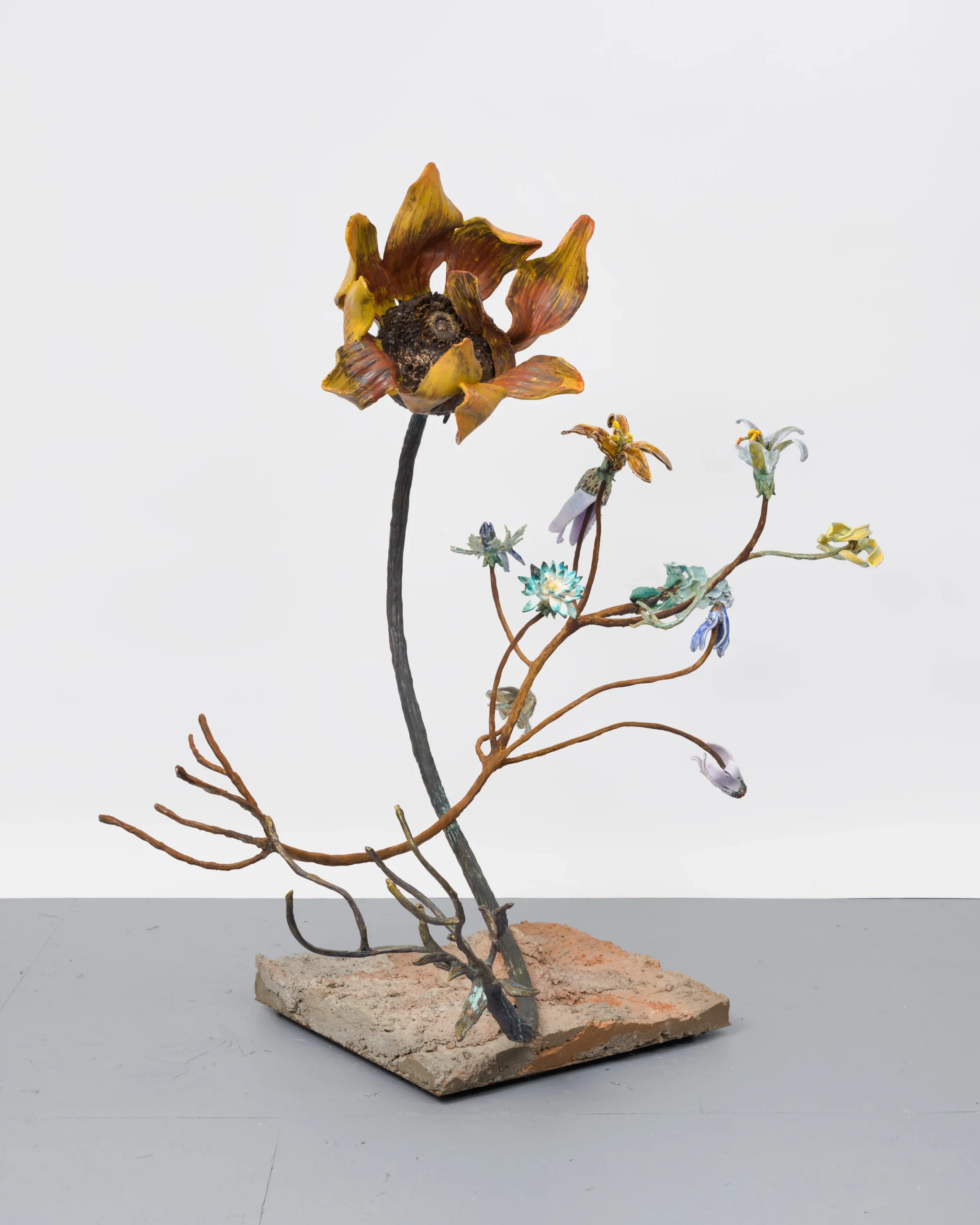 <p>Rebecca Manson<br /><em>Mother’s Day Sunflower</em>, 2022<br />Porcelain, glaze, steel, adhesives, patina, paint, hardware, and concrete<br />60 x 57 x 62 inches / 152.4 x 144.8 x 157.5 cm</p>

