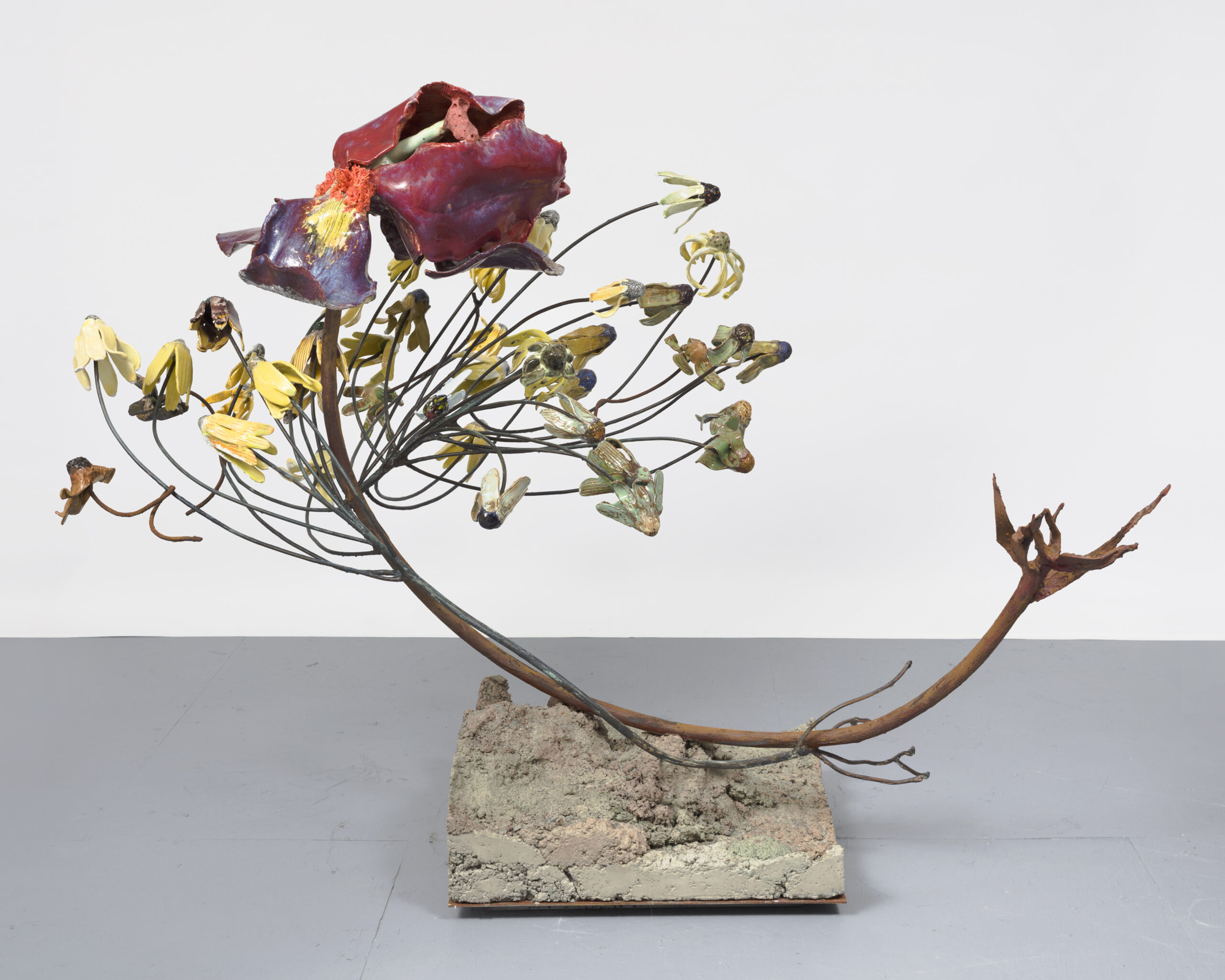 <p>Rebecca Manson<br /><em>Leaning Iris</em>, 2022<br />Porcelain, glaze, steel, adhesives, patina, paint, hardware, and concrete<br />55 x 69 x 52 inches / 139.7 x 175.3 x 132.1 cm</p>
