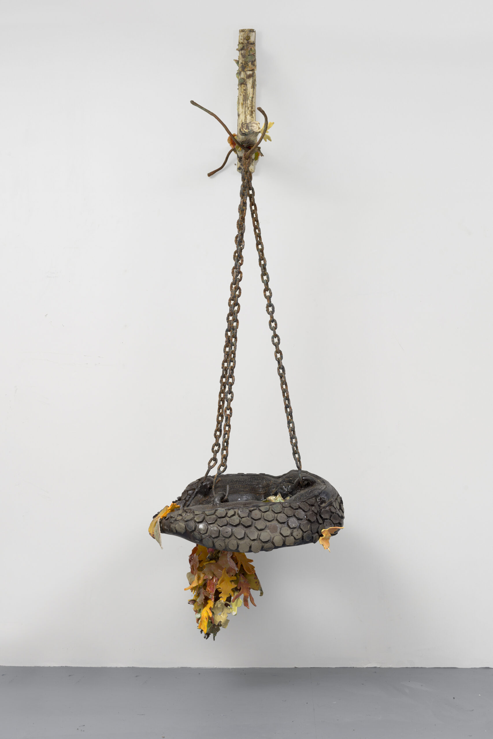 <p>Rebecca Manson<br /><em>Tireswing</em>, 2023<br />Porcelain, stoneware, glaze, adhesives, steel, patina, hardware, glass<br />98 x 30 x 34 inches / 248.9 x 76.2 x 86.4 cm</p>
