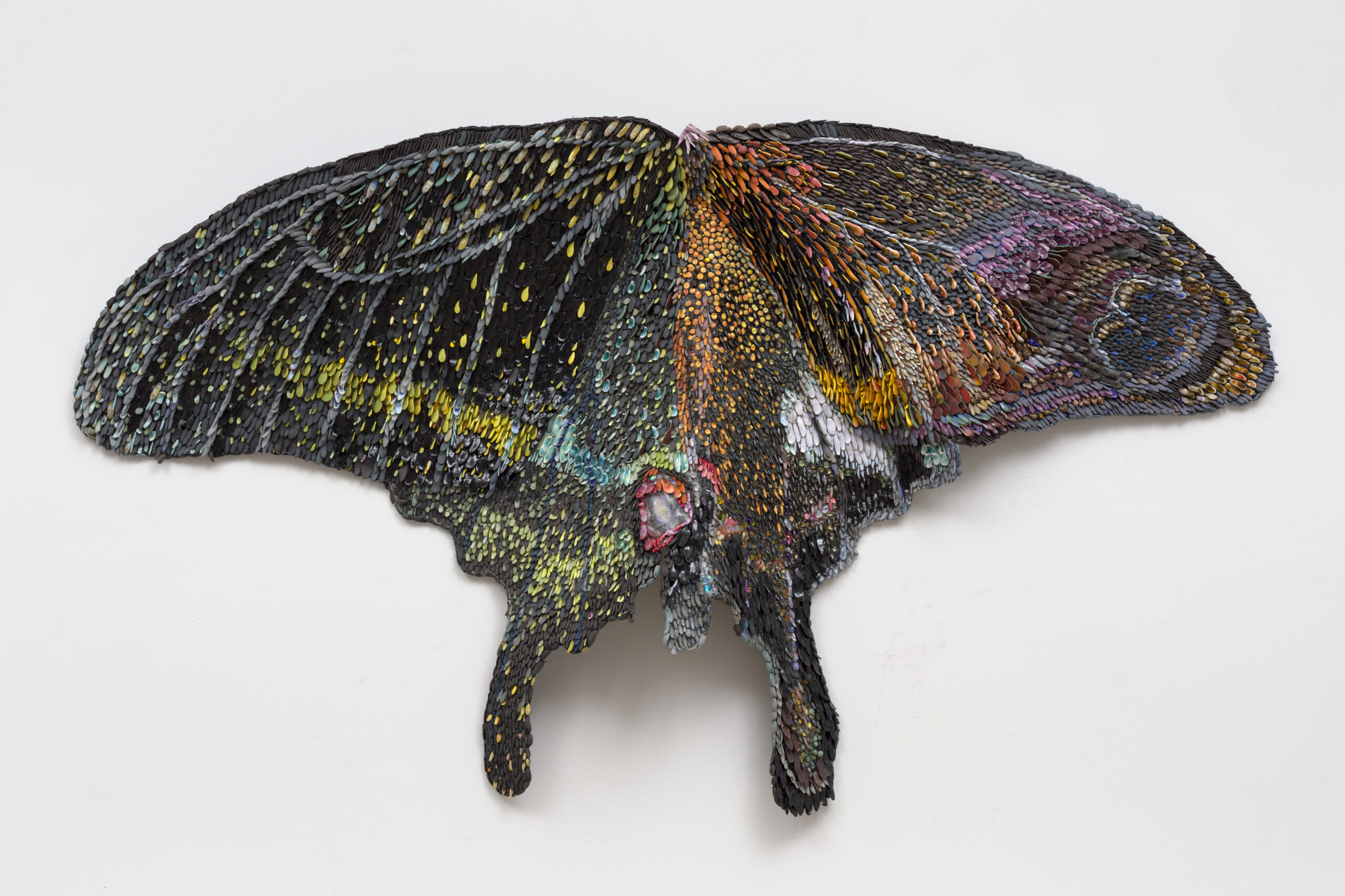 <p>Rebecca Manson<br /><em>Oilslick</em>, 2025<br />Porcelain, glaze, adhesives, canvas, and hardware<br />38 x 64 x 3 inches / 96.5 x 162.6 x 7.6 cm</p>
