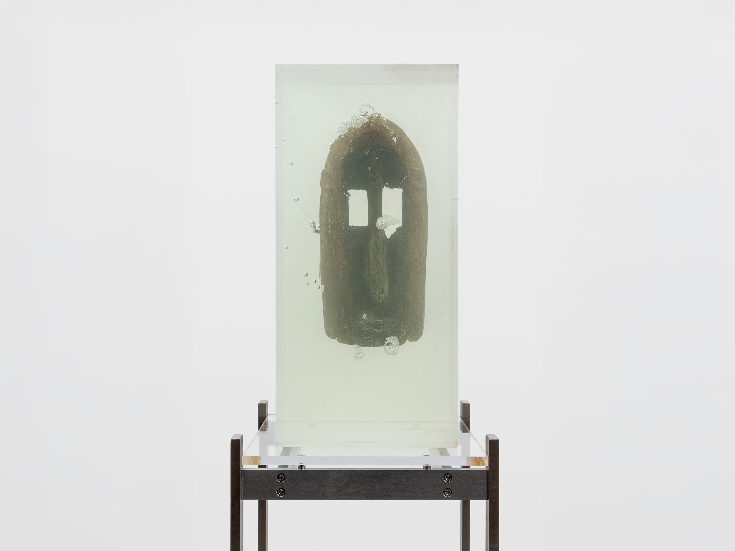 Matthew Angelo Harrison<br><em>Held Breath</em>, 2026<br>African wood mask, polyurethane resin, acrylic, and aluminum stand<br>59 1/2 x 22 1/2 x 25 1/4 inches / 151.1 x 57.1 x 64.1 cm