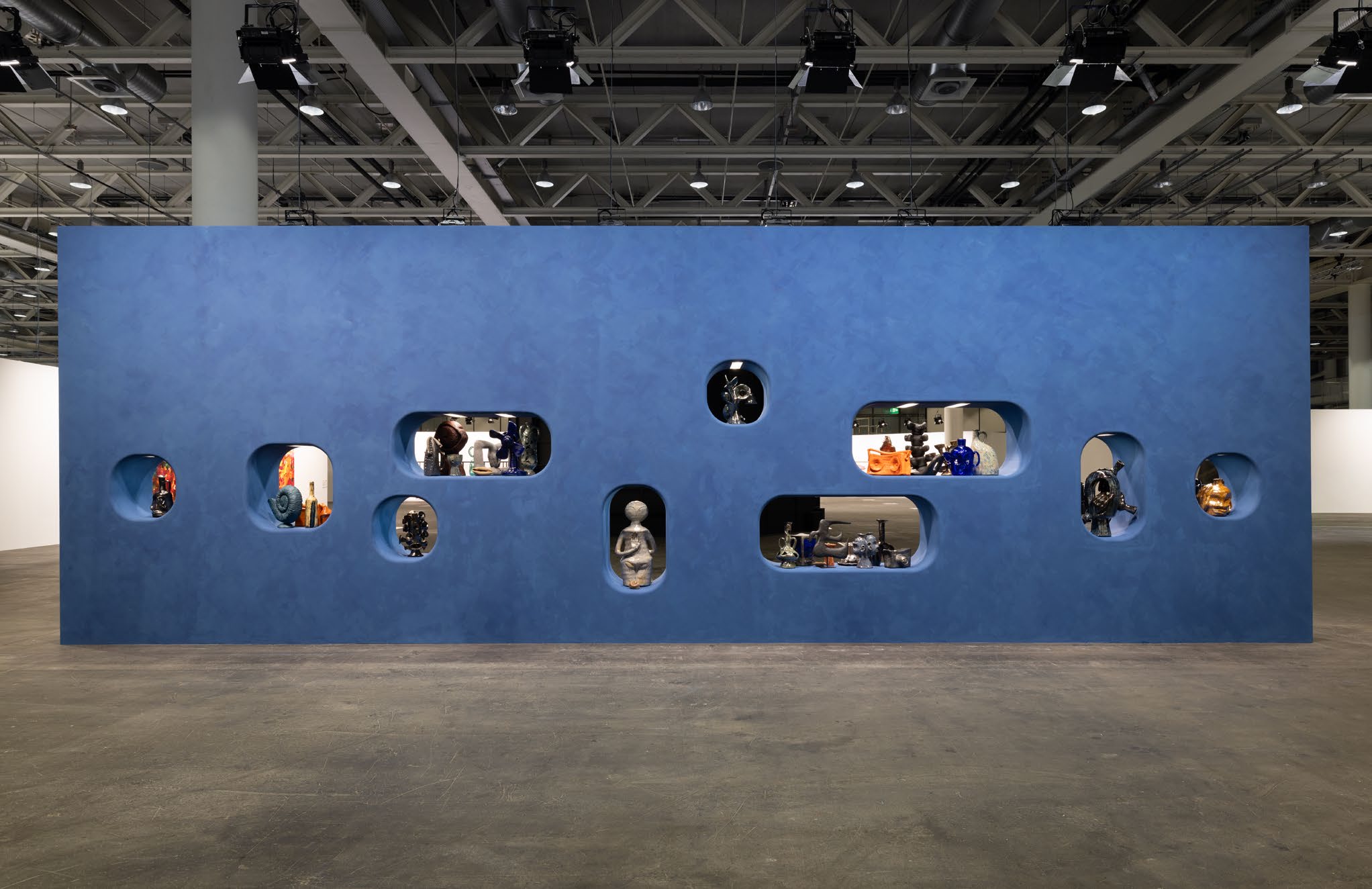 <p>Installation view, Woody De Othello, <i>two sides that hold truth</i>, 2026<BR>Art Basel Unlimited 2026<br />
Glazed ceramic, glass, stone, wood, and fragrance in a freestanding wall<br />
157 1/2 x 472 1/2 x 24 5/8 inches / 400 x 1200 x 62.4 cm</p>
